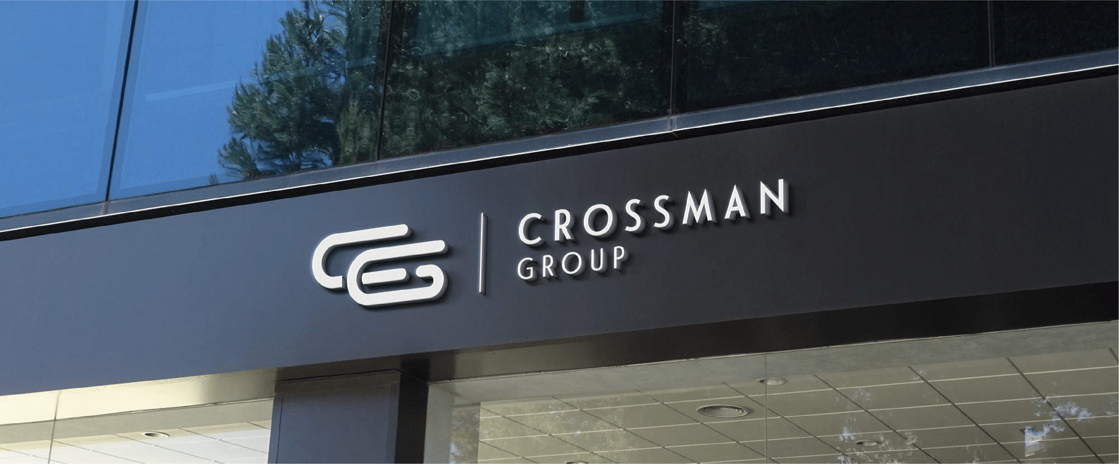 Storefront sign for Crossman Group